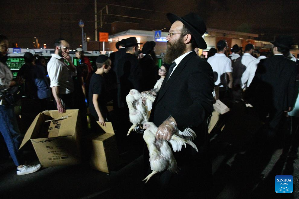 In pics: Kaparot ceremony in Tel Aviv, Israel